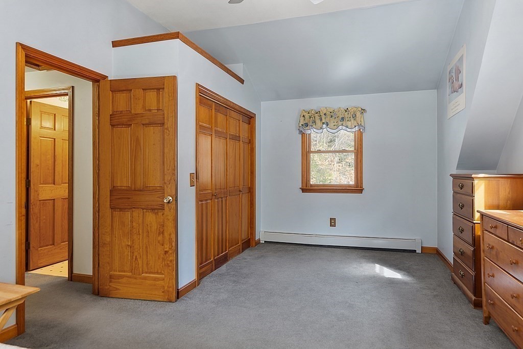 864 Foster Road Ashby, MA 01431 - Photo 21 of 41 an empty room with windows and closet