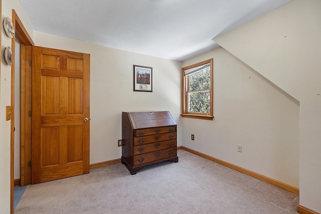 864 Foster Road Ashby, MA 01431 - Photo 23 of 41 a view of room with furniture and cabinet
