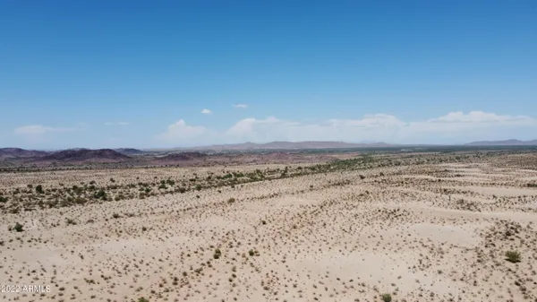 a view of mountain with sunset view
