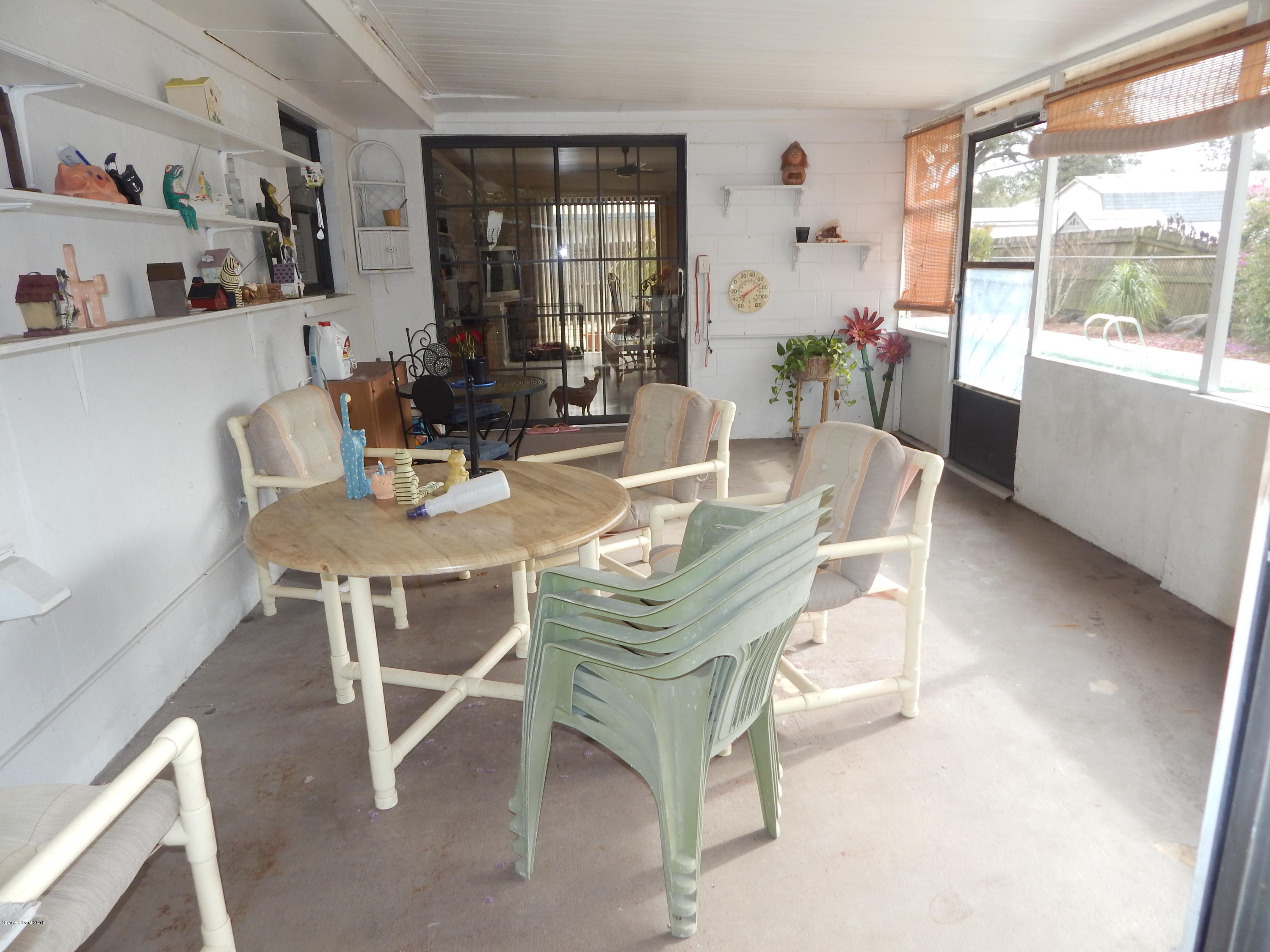 3039 Pembrooke Road Titusville, FL 32796 - Photo 17 of 18 SCREENED PORCH