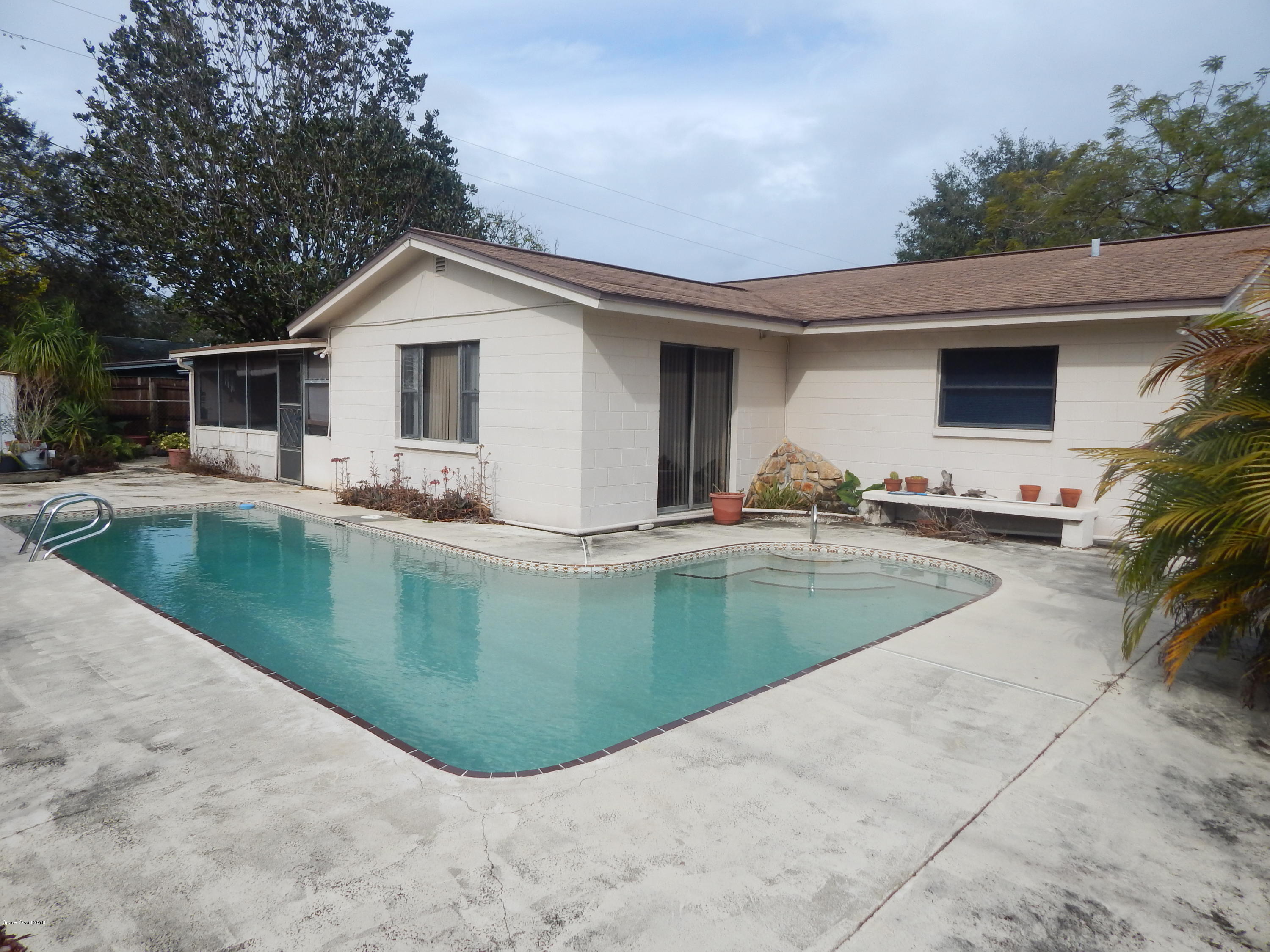3039 Pembrooke Road Titusville, FL 32796 - Photo 4 of 18 INGROUND POOL