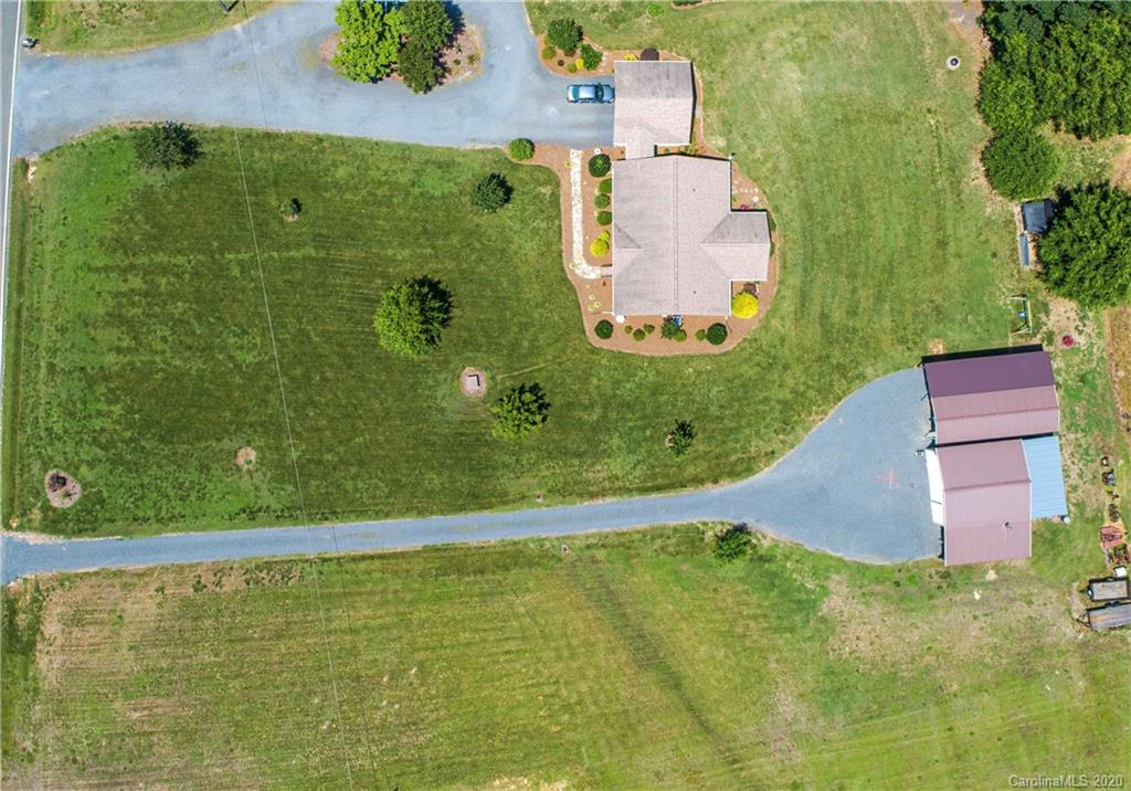 24376 Endy Road Albemarle, NC 28001 - Photo 10 of 27 an aerial view of a houses with a yard
