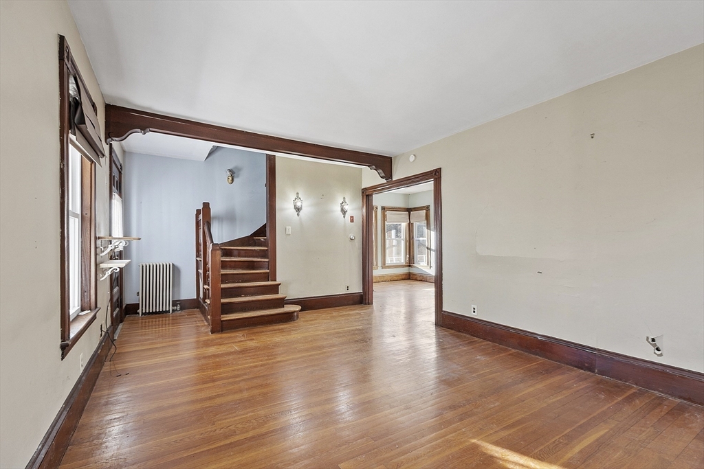 39 Terrace Street Orange, MA 01364 - Photo 14 of 40 a view of a hallway with stairs and furniture