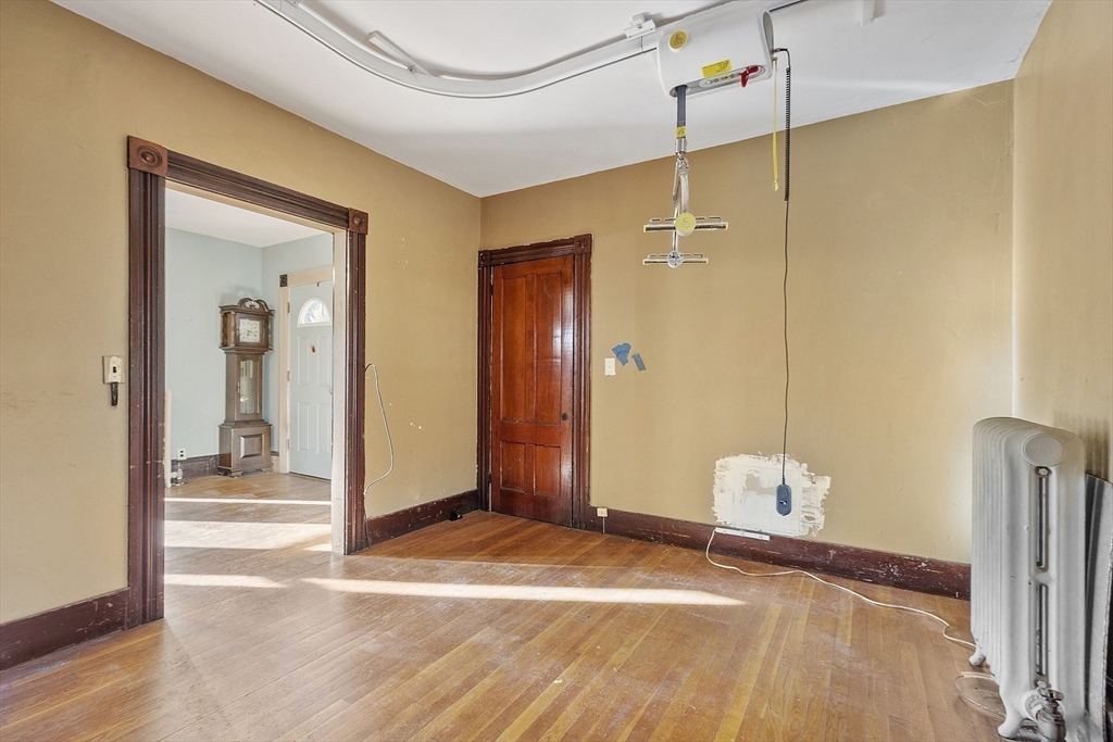 39 Terrace Street Orange, MA 01364 - Photo 27 of 40 a view of a livingroom with wooden floor and a bathroom