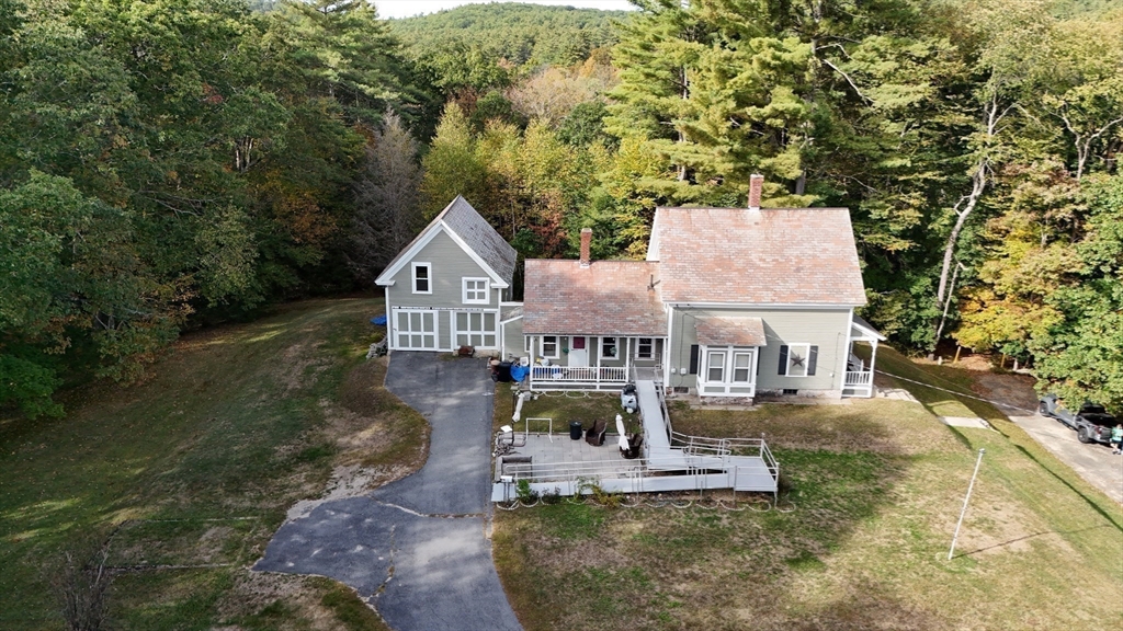 39 Terrace Street Orange, MA 01364 - Photo 31 of 40 an aerial view of a house with swimming pool