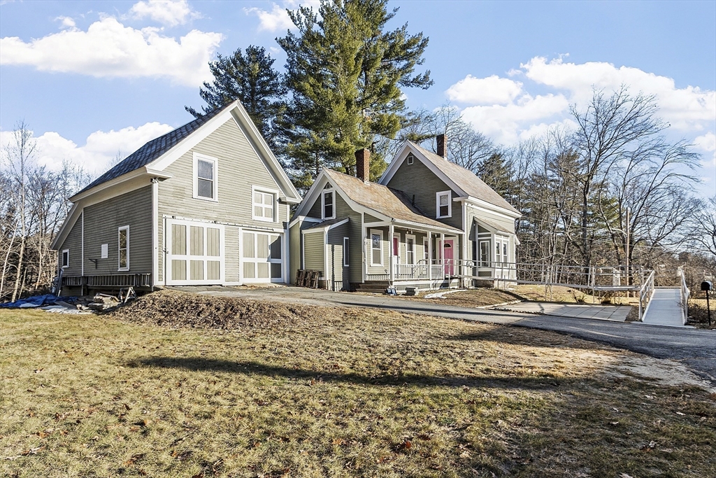 39 Terrace Street Orange, MA 01364 - Photo 34 of 40 a front view of a house with a yard