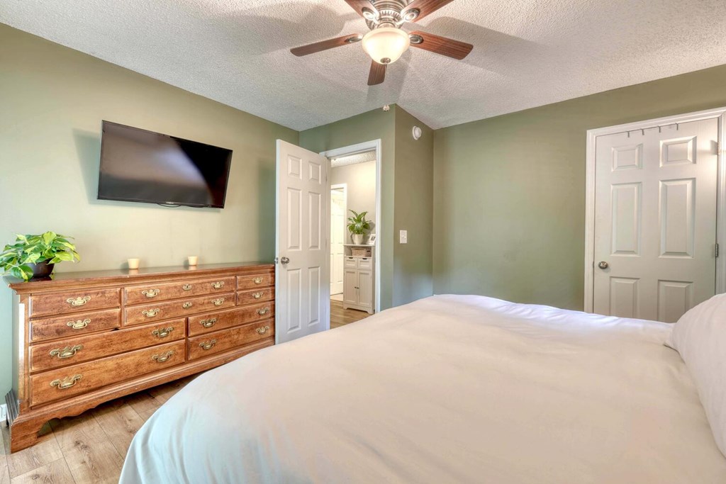 14 Priscilla Lane Murphy, NC 28906 - Photo 15 of 42 a bedroom with a bed and a flat screen tv
