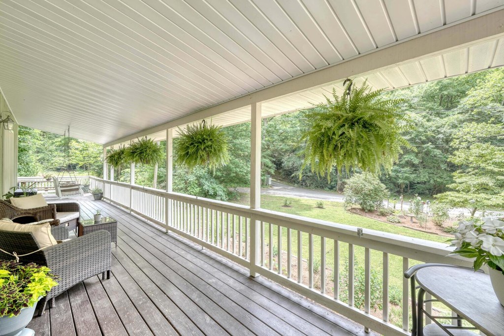 14 Priscilla Lane Murphy, NC 28906 - Photo 20 of 42 a view of a balcony with lake view and wooden floor