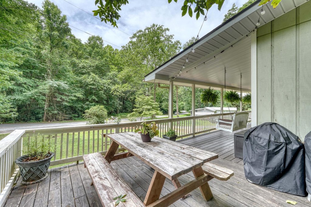 14 Priscilla Lane Murphy, NC 28906 - Photo 24 of 42 a view of balcony with wooden floor and outdoor seating