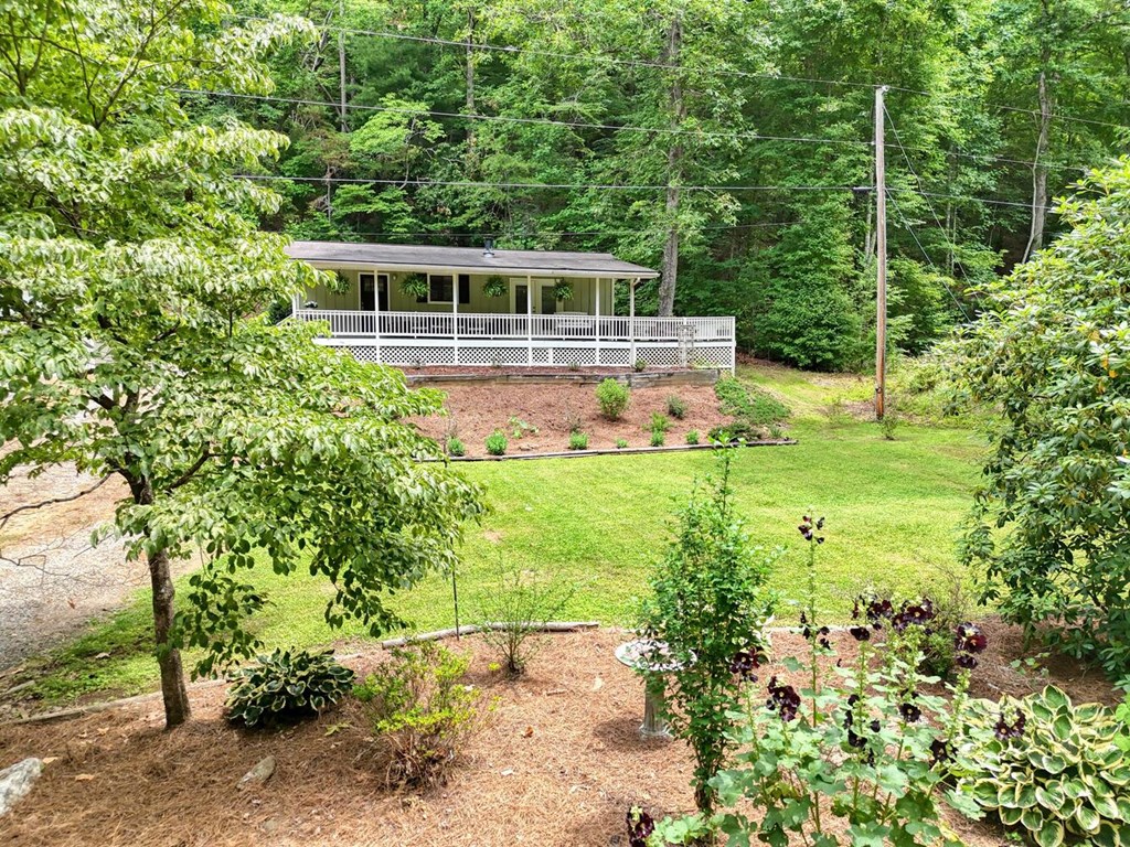 14 Priscilla Lane Murphy, NC 28906 - Photo 36 of 42 a view of house with backyard space and garden