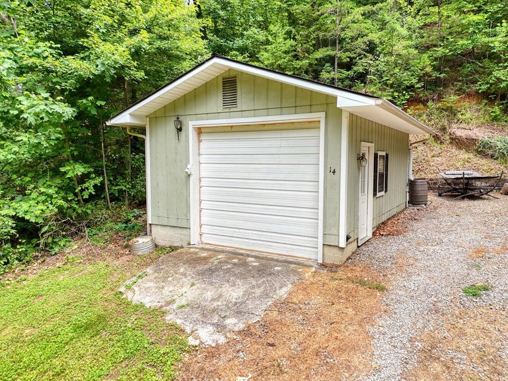 14 Priscilla Lane Murphy, NC 28906 - Photo 5 of 42 a front view of a house with a yard