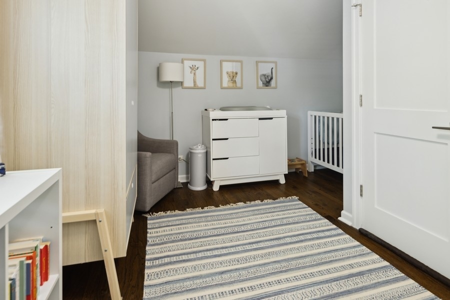 708 Long Road Glenview, IL 60025 - Photo 13 of 23 a bedroom with a bed and a window
