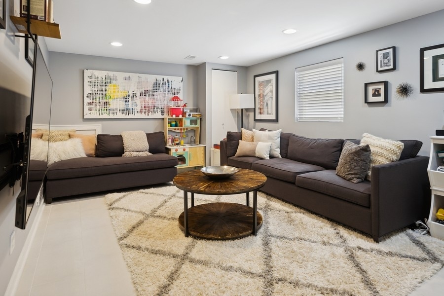708 Long Road Glenview, IL 60025 - Photo 9 of 23 a living room with furniture and a flat screen tv