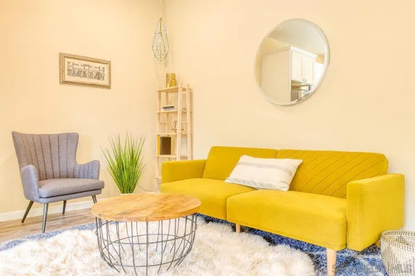 a living room with a couch and a table