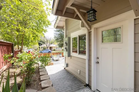 a view of a backyard with patio