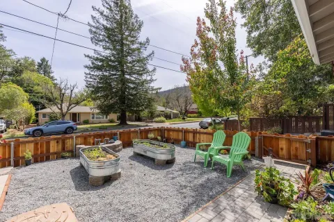 swimming pool view with a seating space