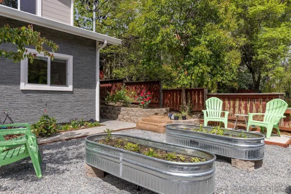 a house view with outdoor seating space