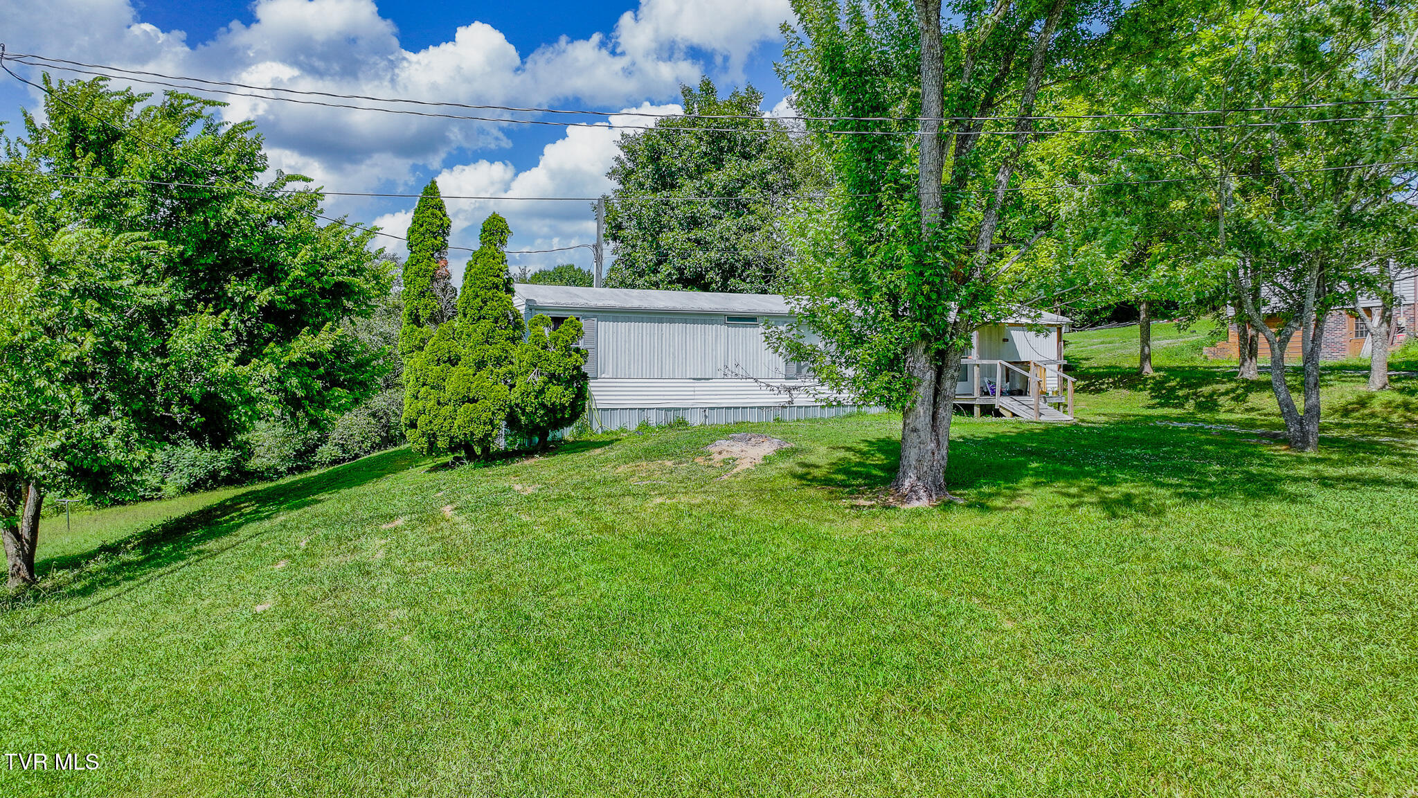 7680 Warrensburg Road Mosheim, TN 37818 - Photo 14 of 20 dji_fly_20250711_155556_0771_17522642662