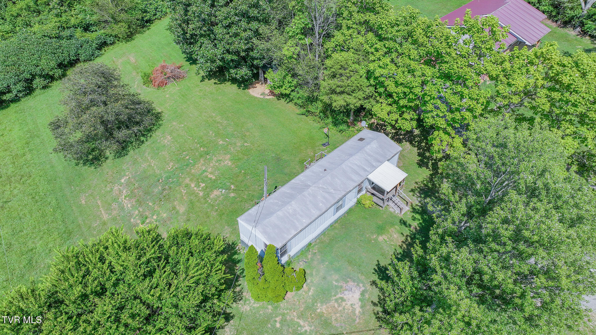 7680 Warrensburg Road Mosheim, TN 37818 - Photo 17 of 20 dji_fly_20250711_160118_0788_17522642611