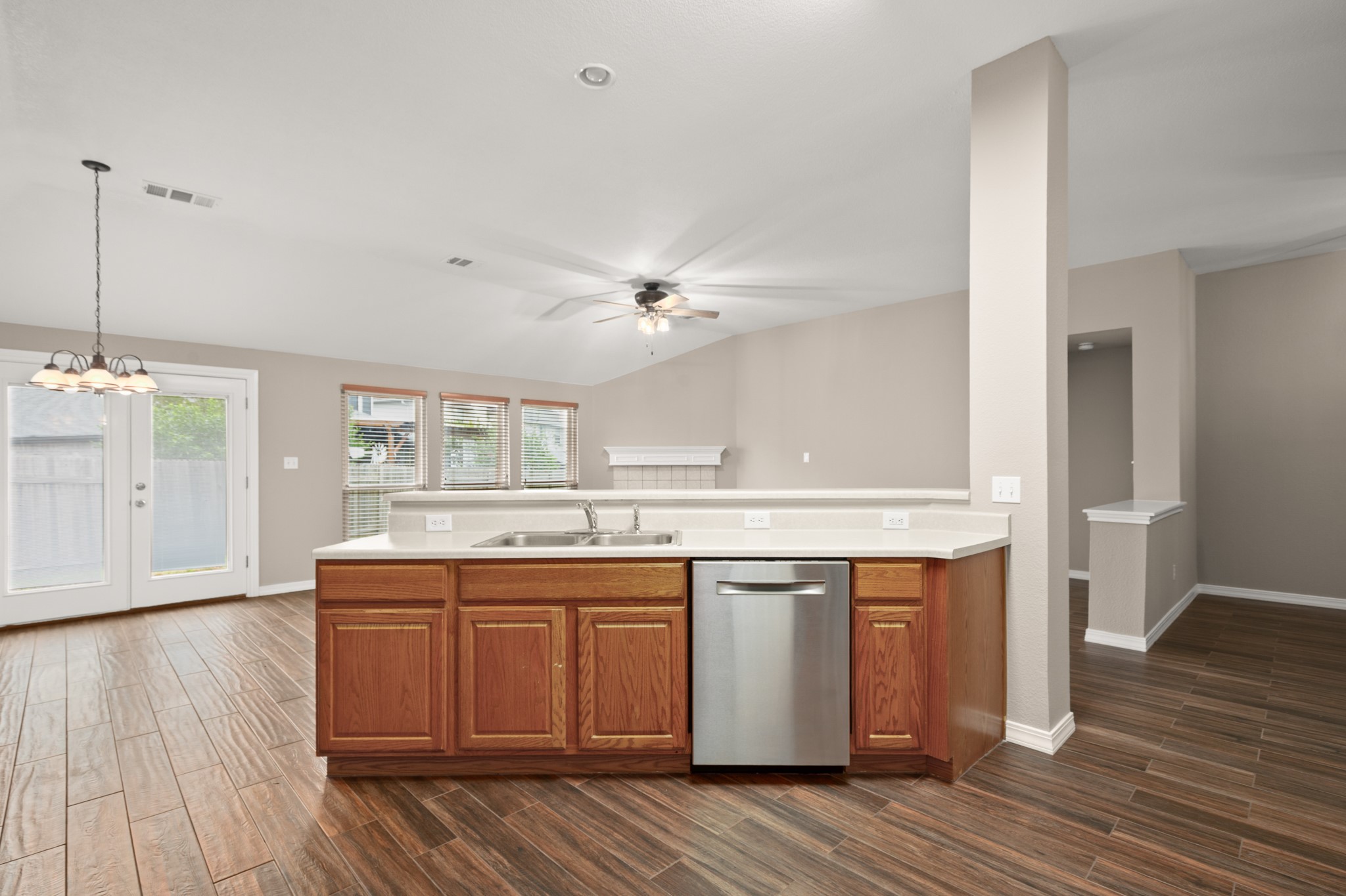 3420 Ribbon Reef Lane Austin, TX 78728 - Photo 7 of 25 Center island with breakfast bar is open to breakfast area, family room and flex space