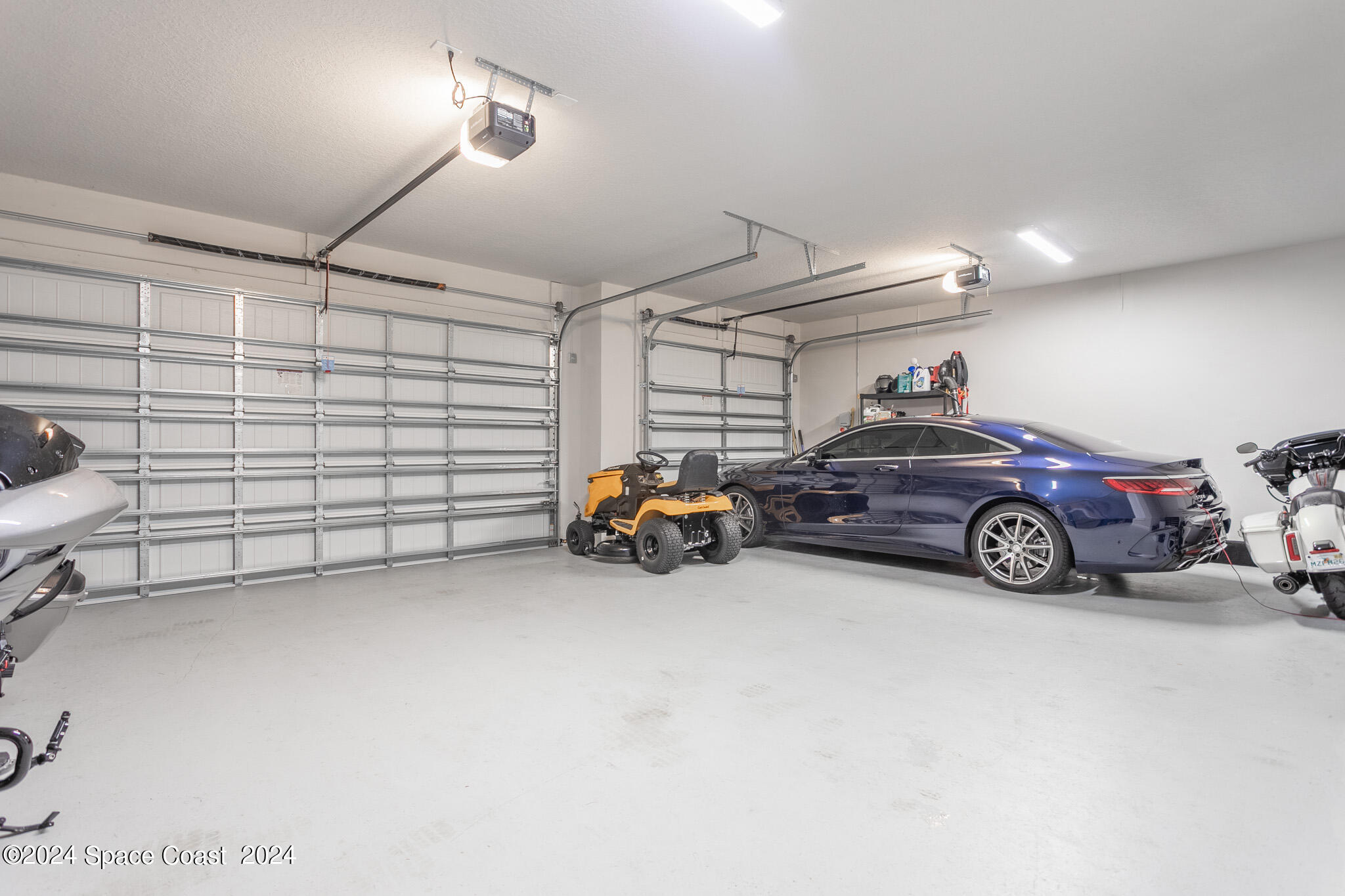 865 Hawks Ridge Court Northeast Palm Bay, FL 32905 - Photo 24 of 47 a view of car garage
