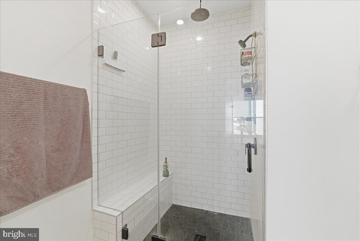 2018 Tysons Ridgeline Road Falls Church, VA 22043 - Photo 14 of 35 a bathroom with a shower