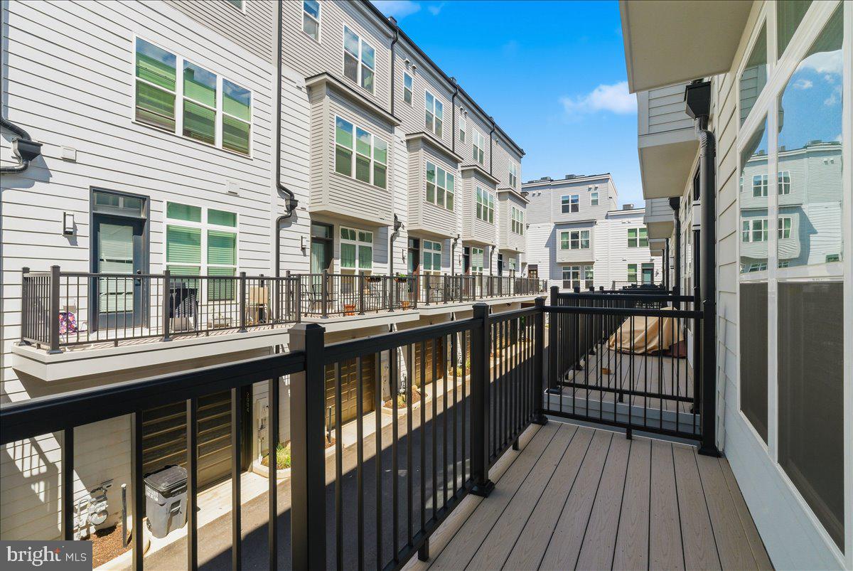 2018 Tysons Ridgeline Road Falls Church, VA 22043 - Photo 7 of 35 a view of a balcony with wooden floor