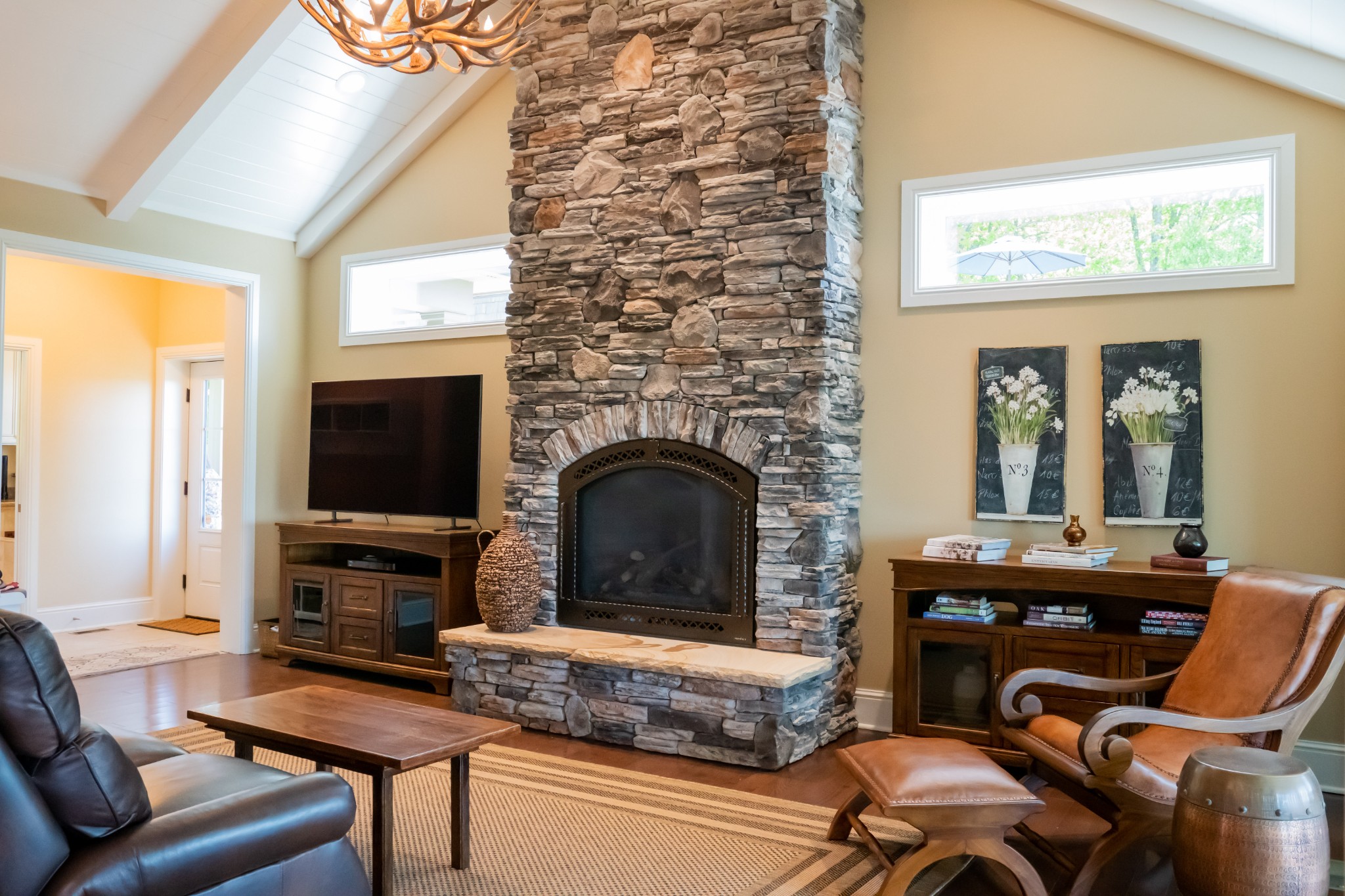 1000 Sunny Point Road Baxter, TN 38544 - Photo 29 of 58 a living room with furniture a flat screen tv and a fireplace