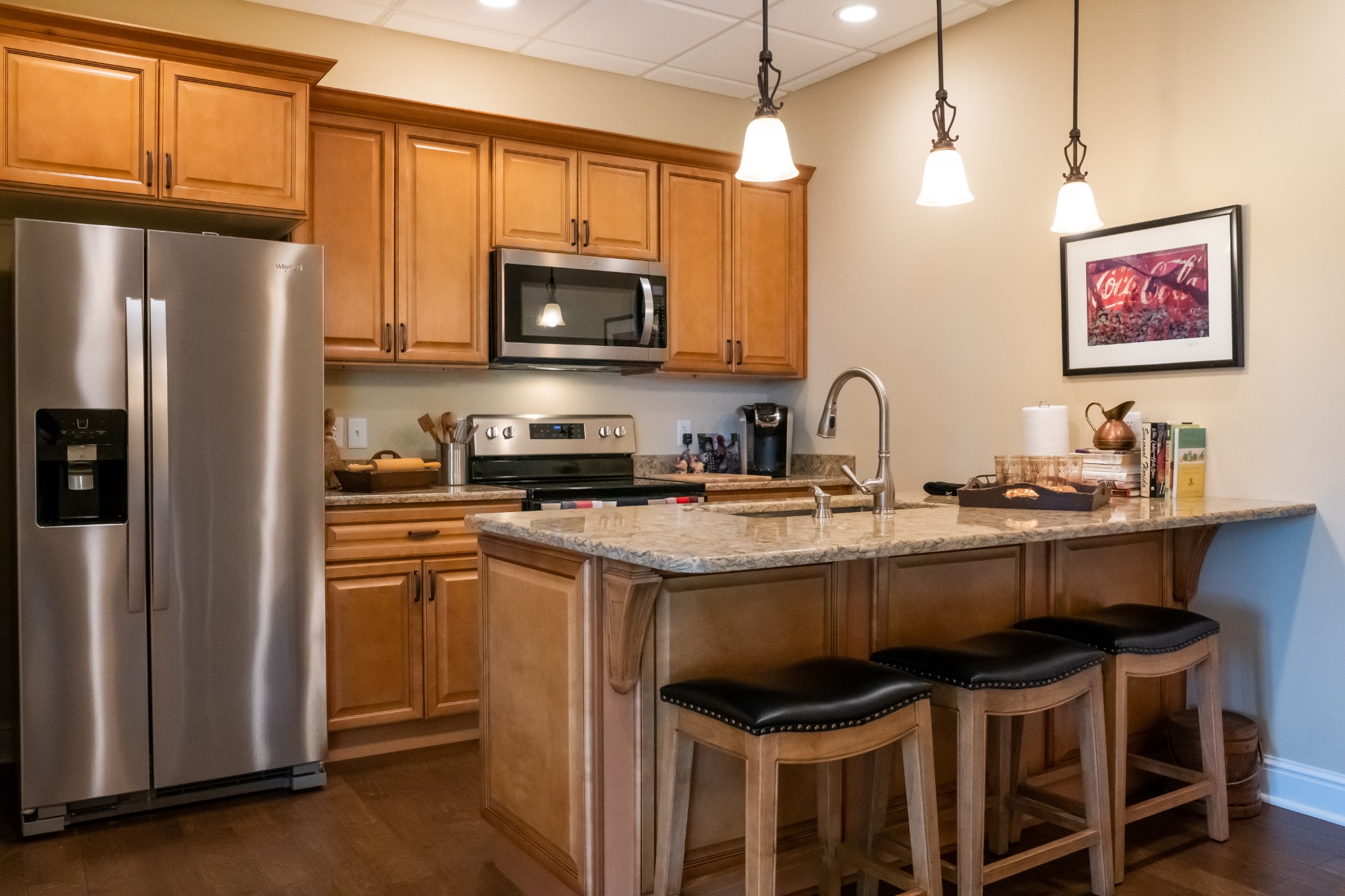 1000 Sunny Point Road Baxter, TN 38544 - Photo 38 of 58 a kitchen with stainless steel appliances granite countertop a stove a refrigerator and a microwave