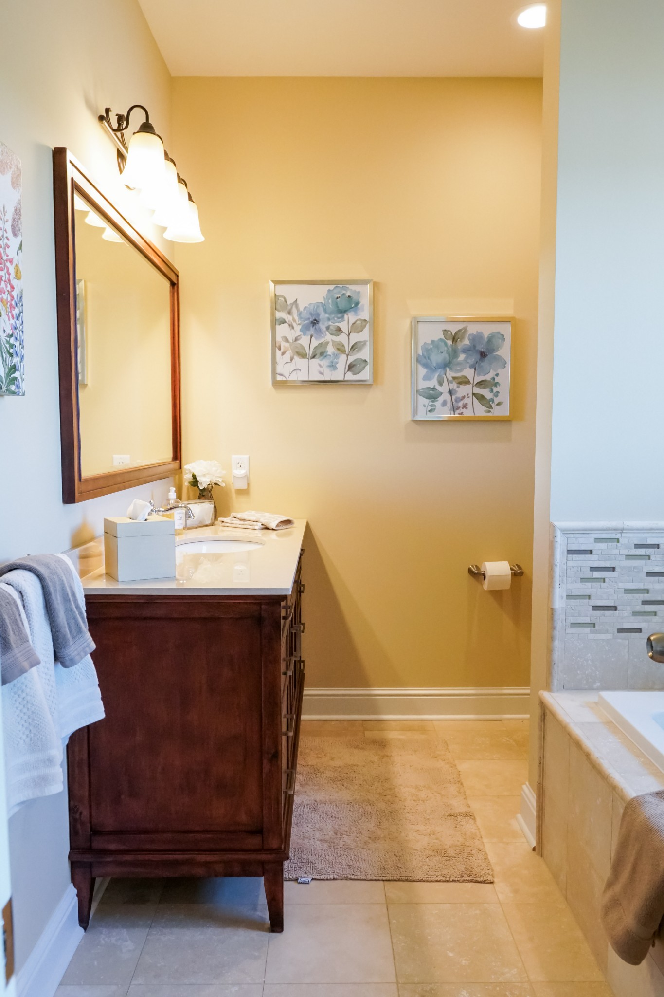 1000 Sunny Point Road Baxter, TN 38544 - Photo 42 of 58 a bathroom with a sink mirror and a bath tub
