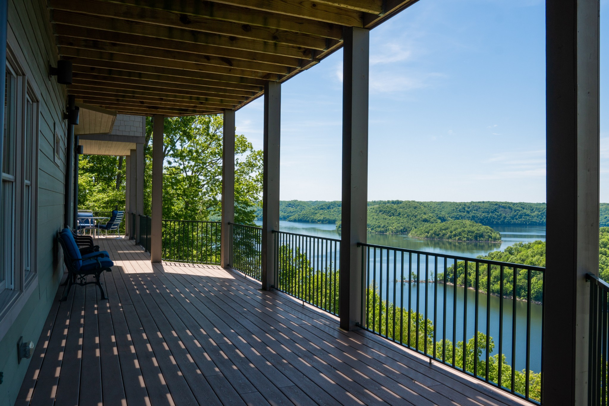 1000 Sunny Point Road Baxter, TN 38544 - Photo 48 of 58 a view of a balcony with chairs and wooden floor