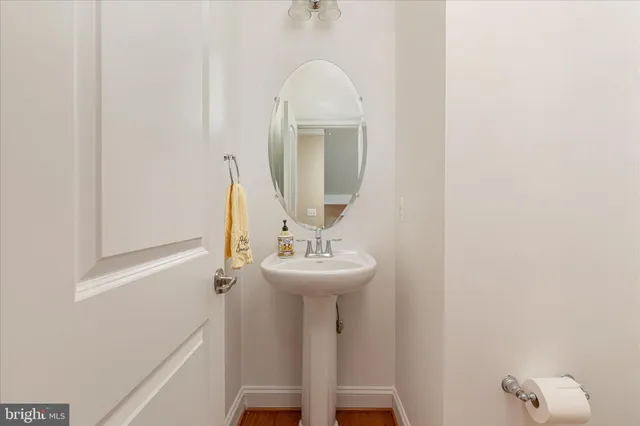 a view of a room with furniture and a window