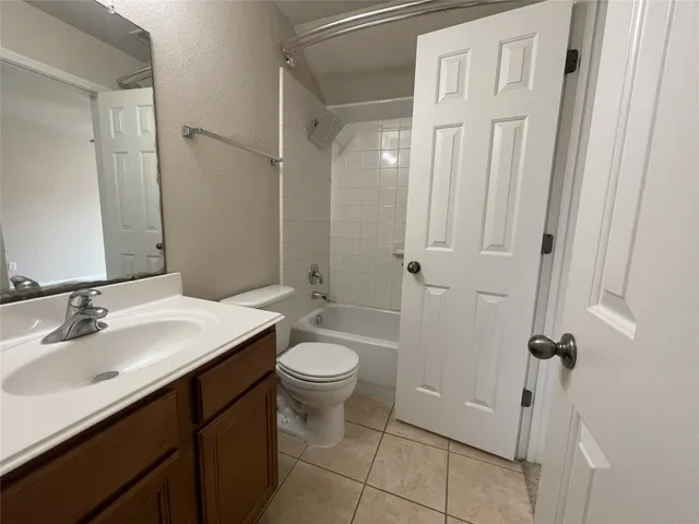 a view of empty room with windows