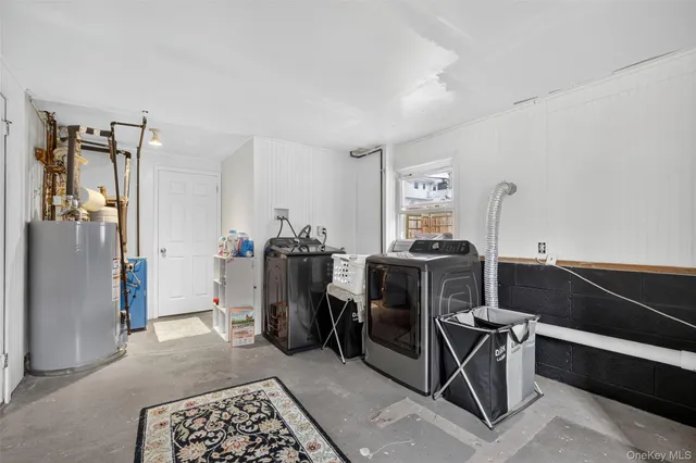 a view of a house with a backyard porch and sitting area