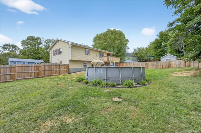 a house view with a garden space