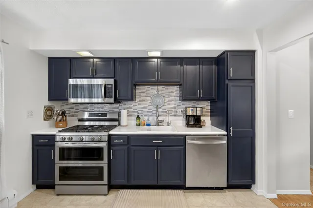 a view of a dining room with furniture wooden floor and chandelier