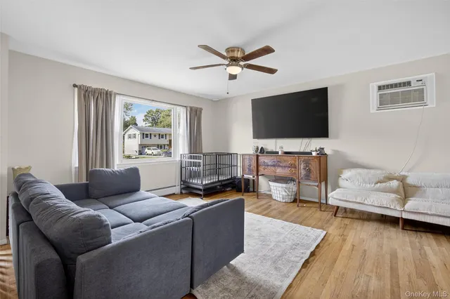 a kitchen with stainless steel appliances a stove microwave and refrigerator