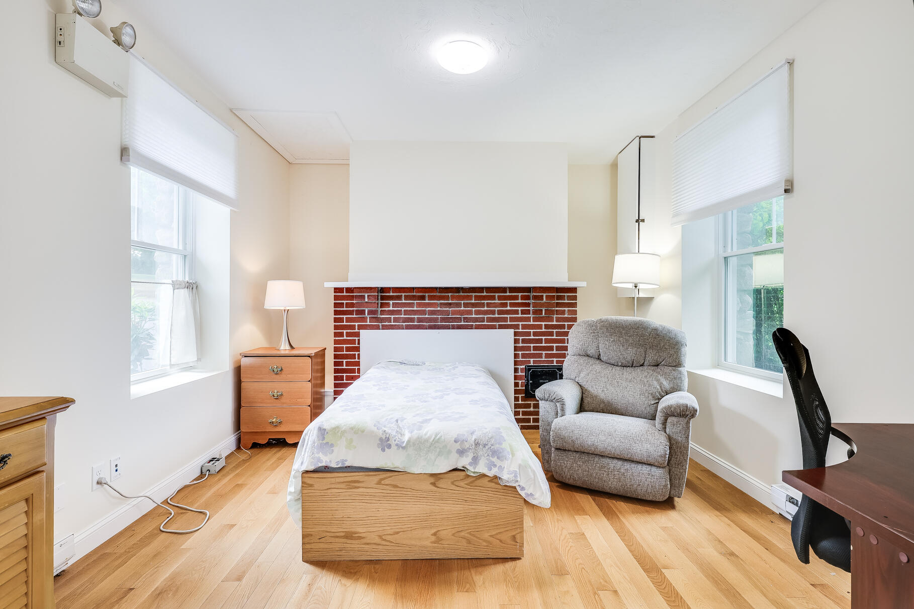 165 Woods Hole Road Falmouth, MA 02540 - Photo 29 of 35 a living room with furniture and a wooden floor
