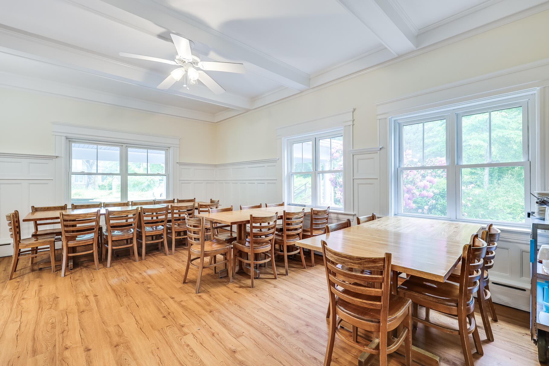 165 Woods Hole Road Falmouth, MA 02540 - Photo 8 of 35 a view of a dining room with furniture window and wooden floor