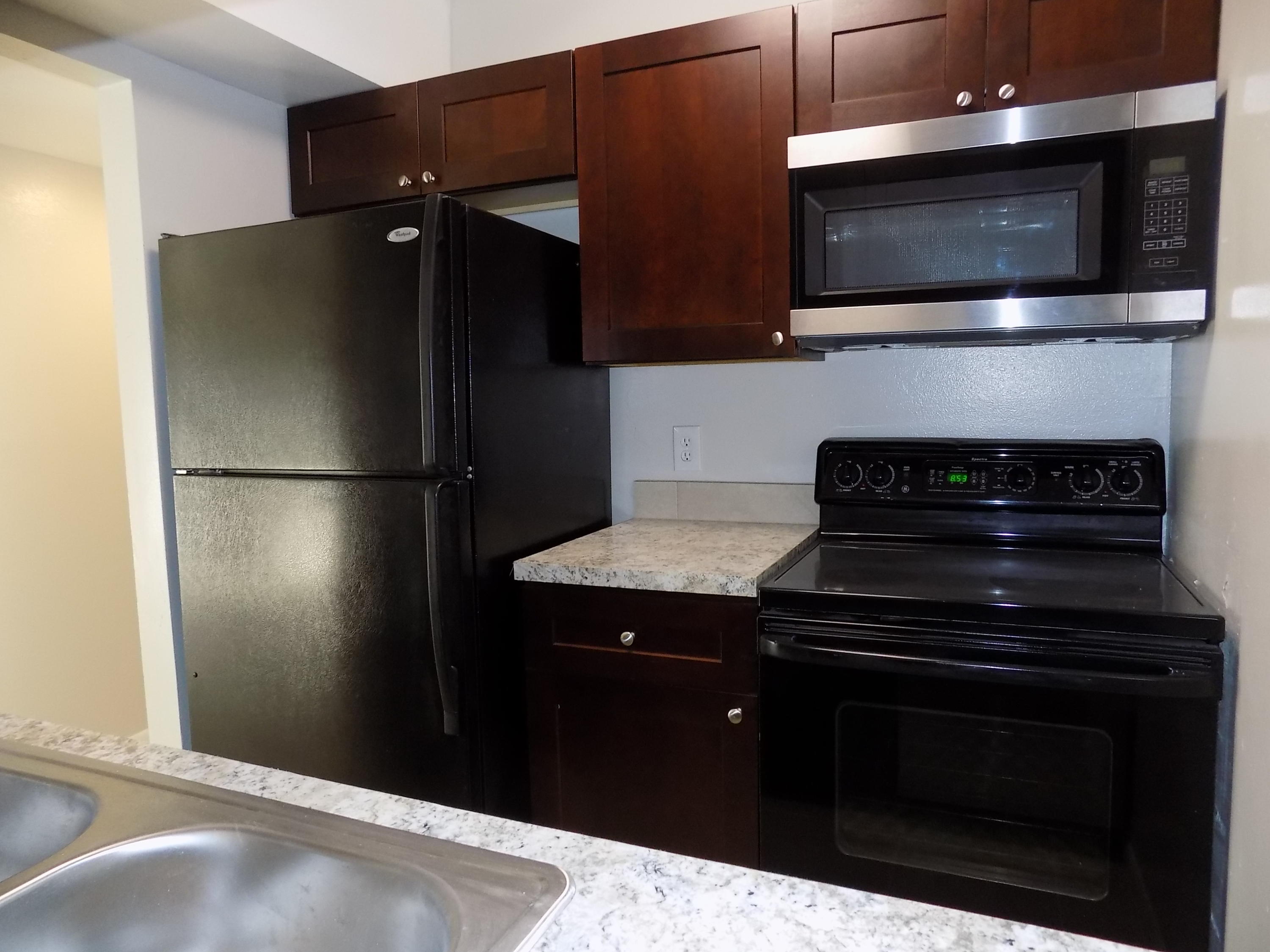 1798 Abbey Road, Unit C201 West Palm Beach, FL 33415 - Photo 1 of 26 Updated Kitchen Area
