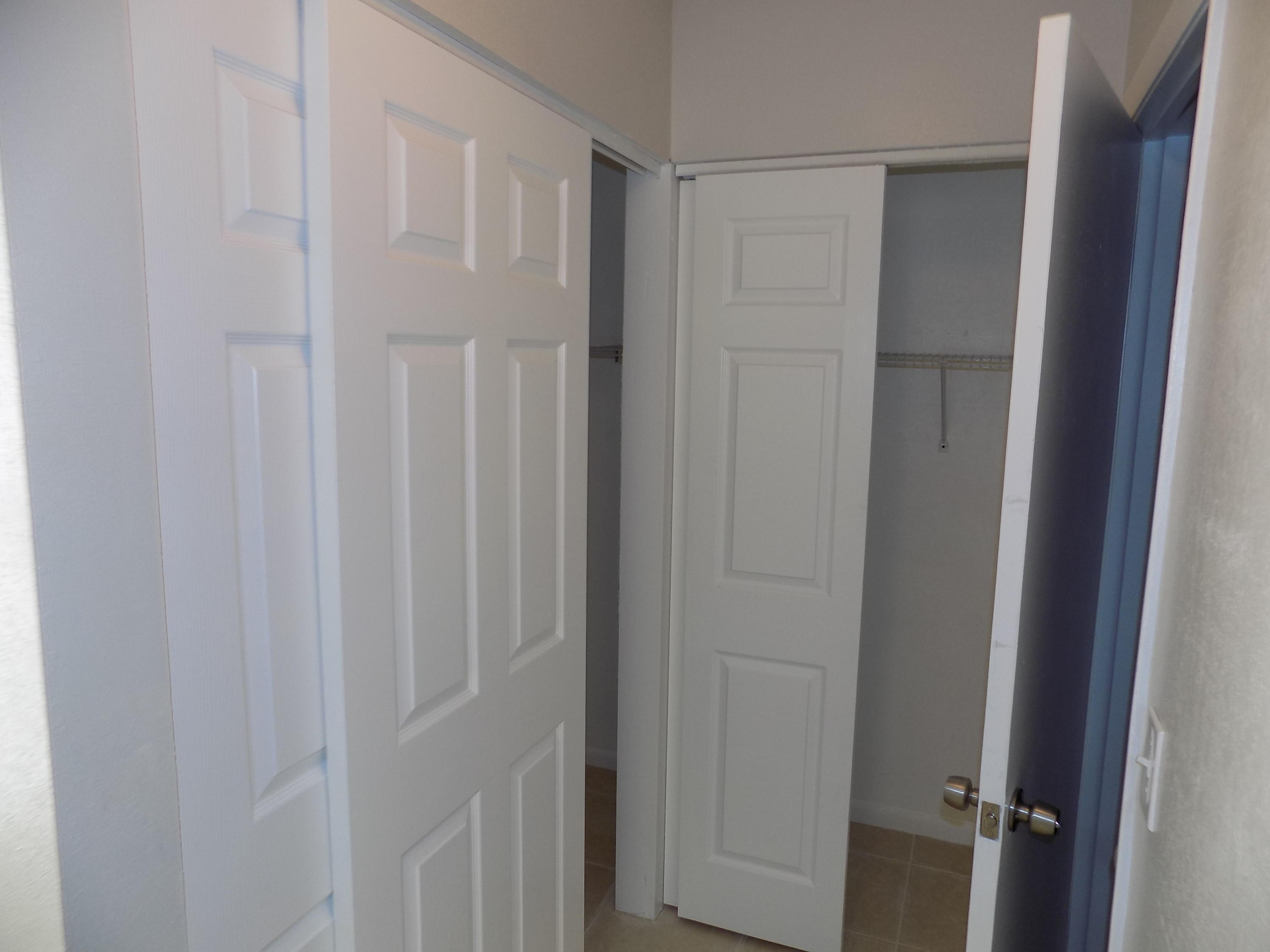 1798 Abbey Road, Unit C201 West Palm Beach, FL 33415 - Photo 11 of 26 Master Bedroom Suite