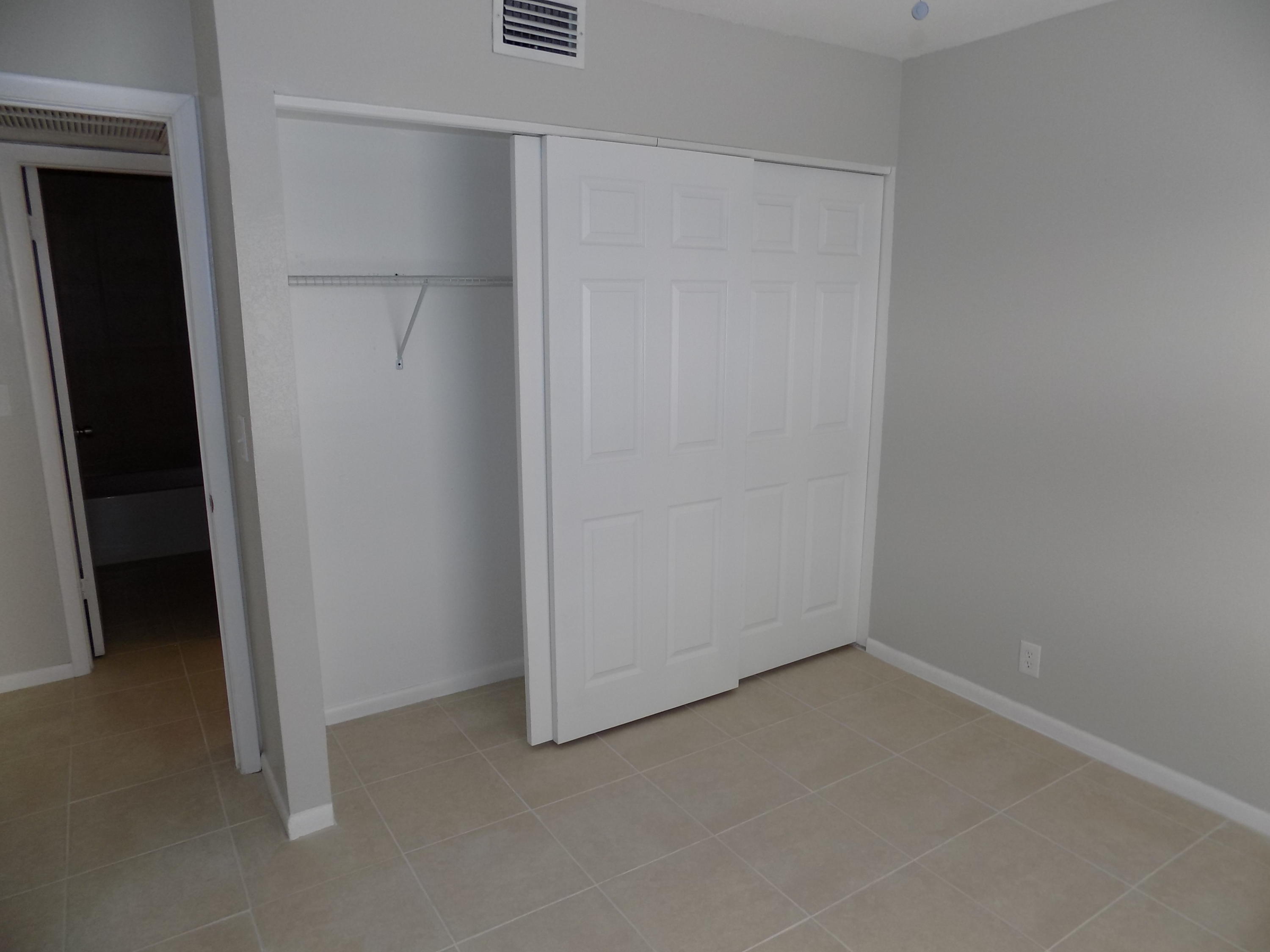 1798 Abbey Road, Unit C201 West Palm Beach, FL 33415 - Photo 18 of 26 2nd Bedroom Area