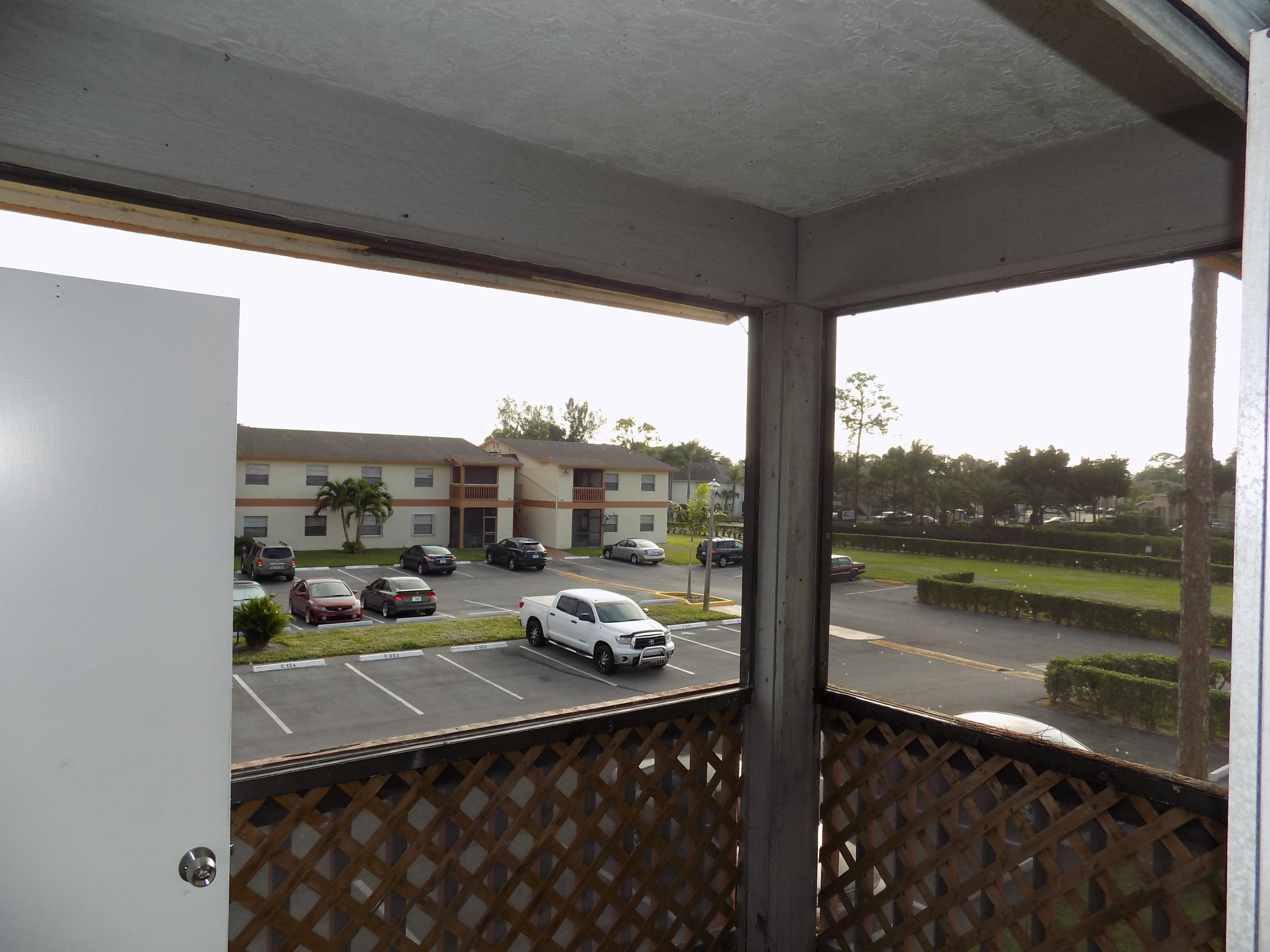 1798 Abbey Road, Unit C201 West Palm Beach, FL 33415 - Photo 20 of 26 Patio Area