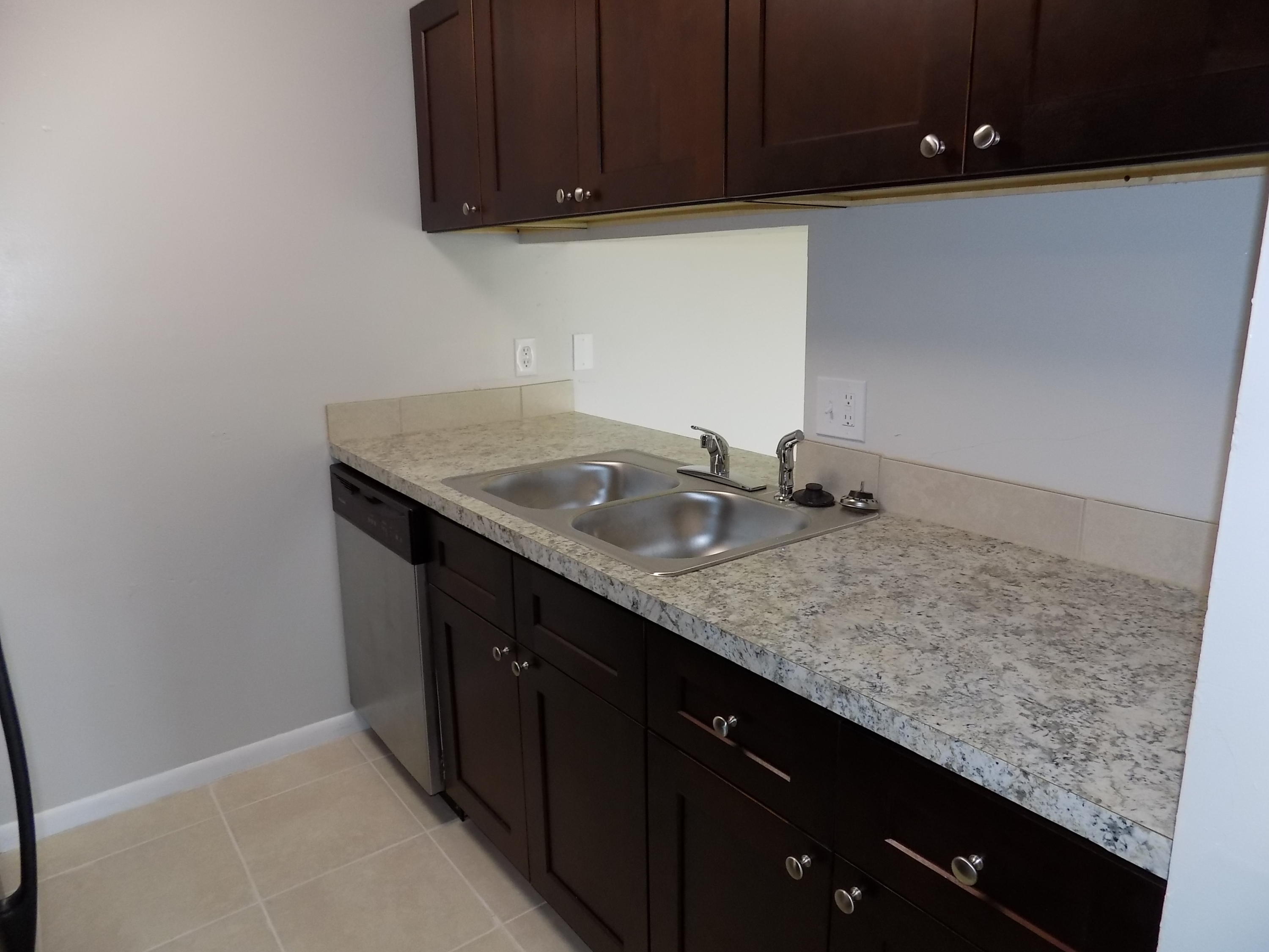 1798 Abbey Road, Unit C201 West Palm Beach, FL 33415 - Photo 2 of 26 Updated Kitchen Area