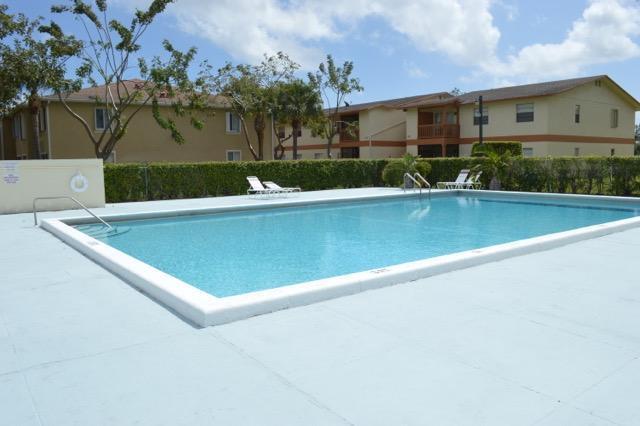 1798 Abbey Road, Unit C201 West Palm Beach, FL 33415 - Photo 24 of 26 Community Pool Area