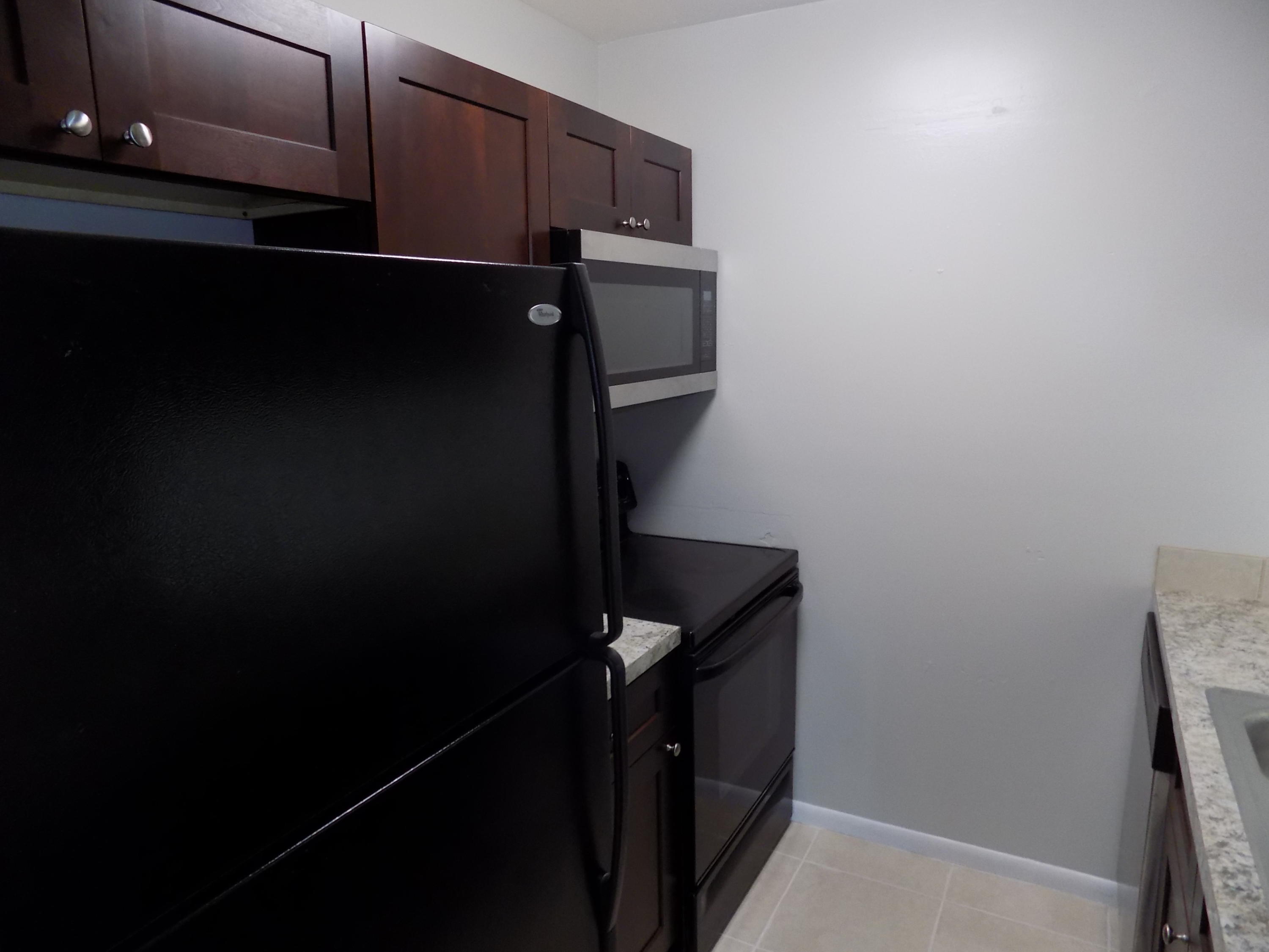 1798 Abbey Road, Unit C201 West Palm Beach, FL 33415 - Photo 3 of 26 Updated Kitchen Area