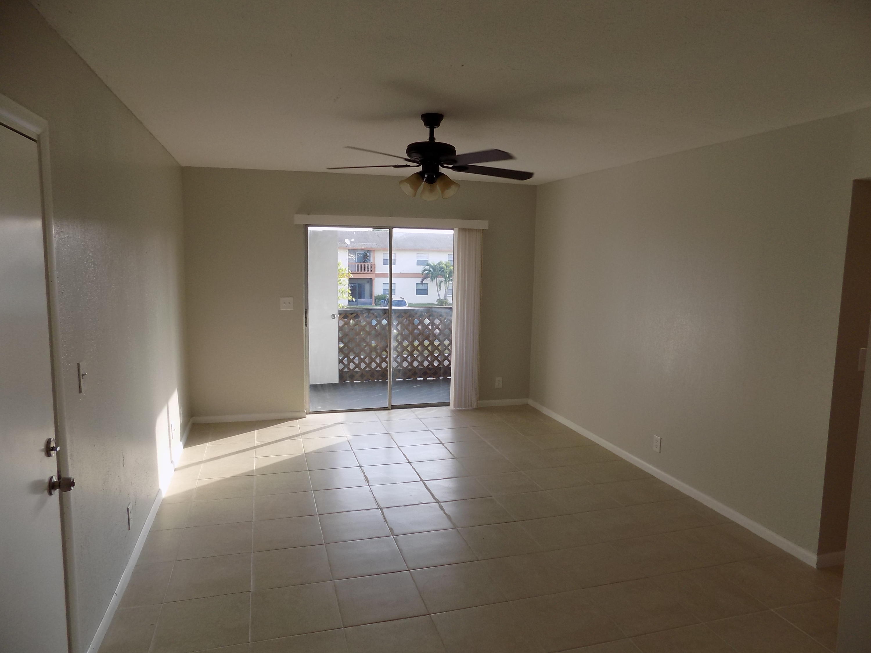 1798 Abbey Road, Unit C201 West Palm Beach, FL 33415 - Photo 4 of 26 Entry Living Area