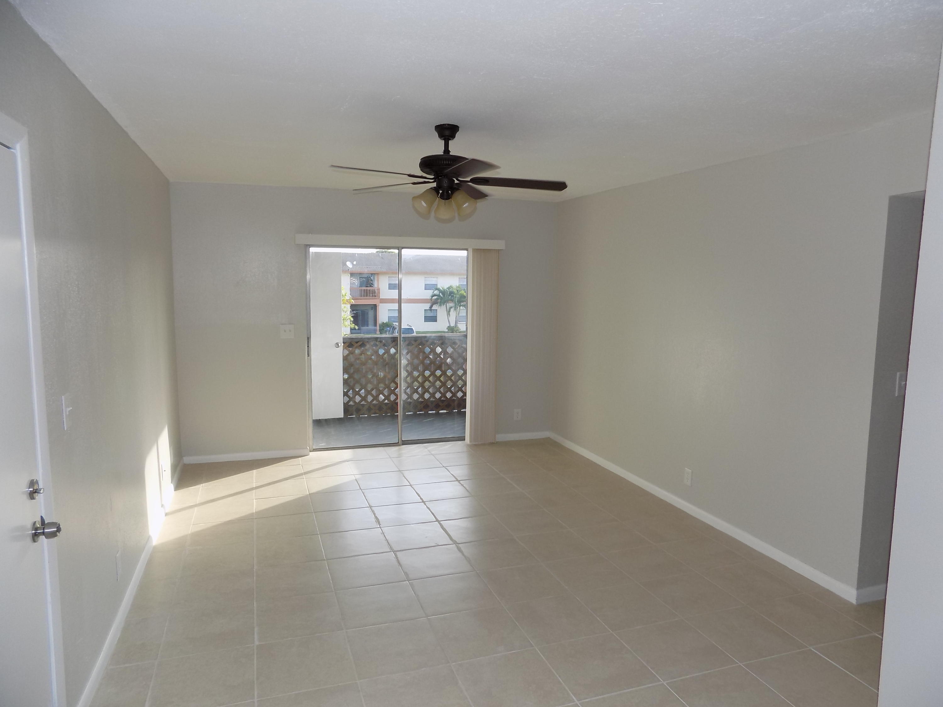1798 Abbey Road, Unit C201 West Palm Beach, FL 33415 - Photo 5 of 26 Entry Living Area