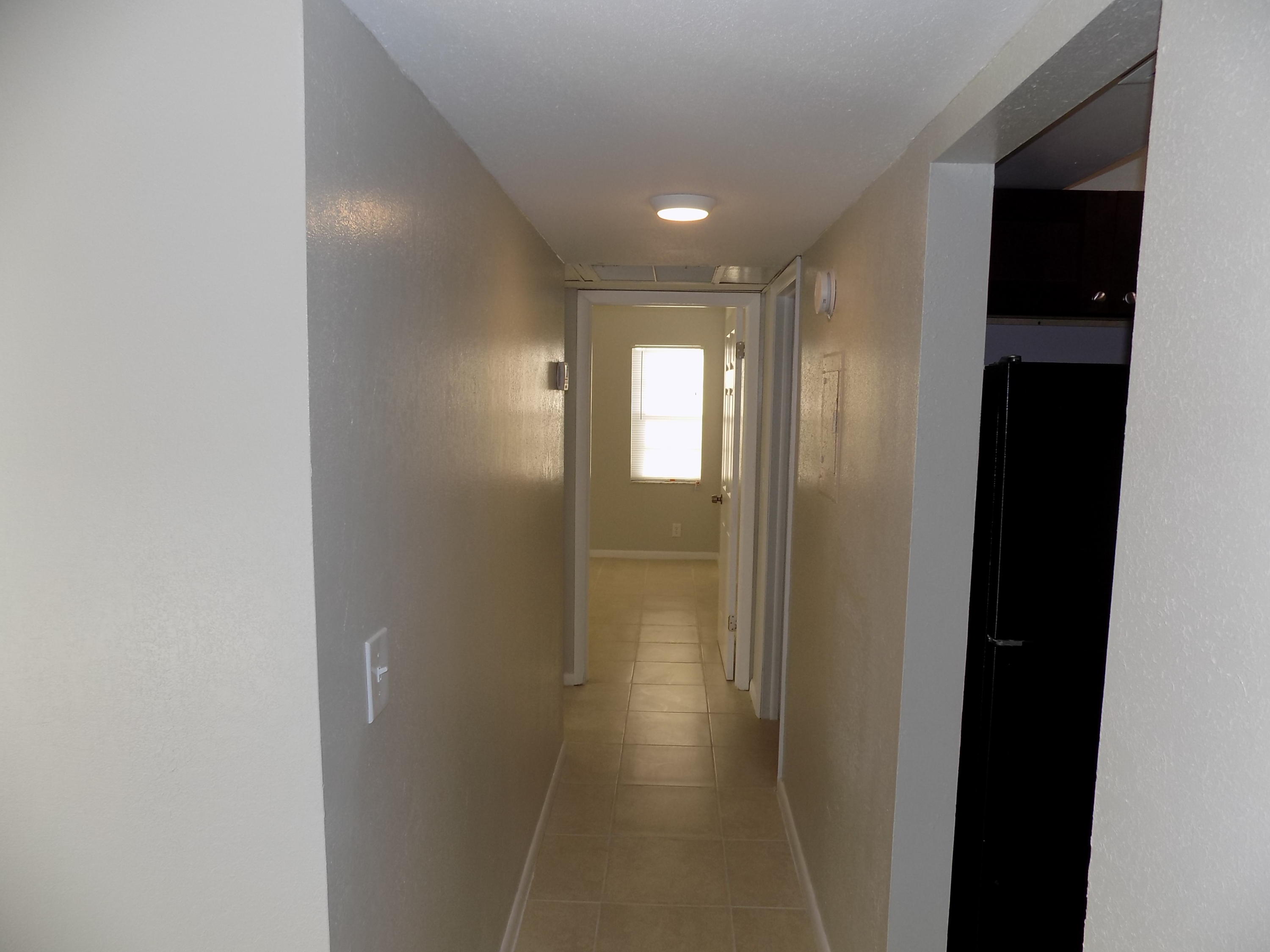 1798 Abbey Road, Unit C201 West Palm Beach, FL 33415 - Photo 8 of 26 Hallway