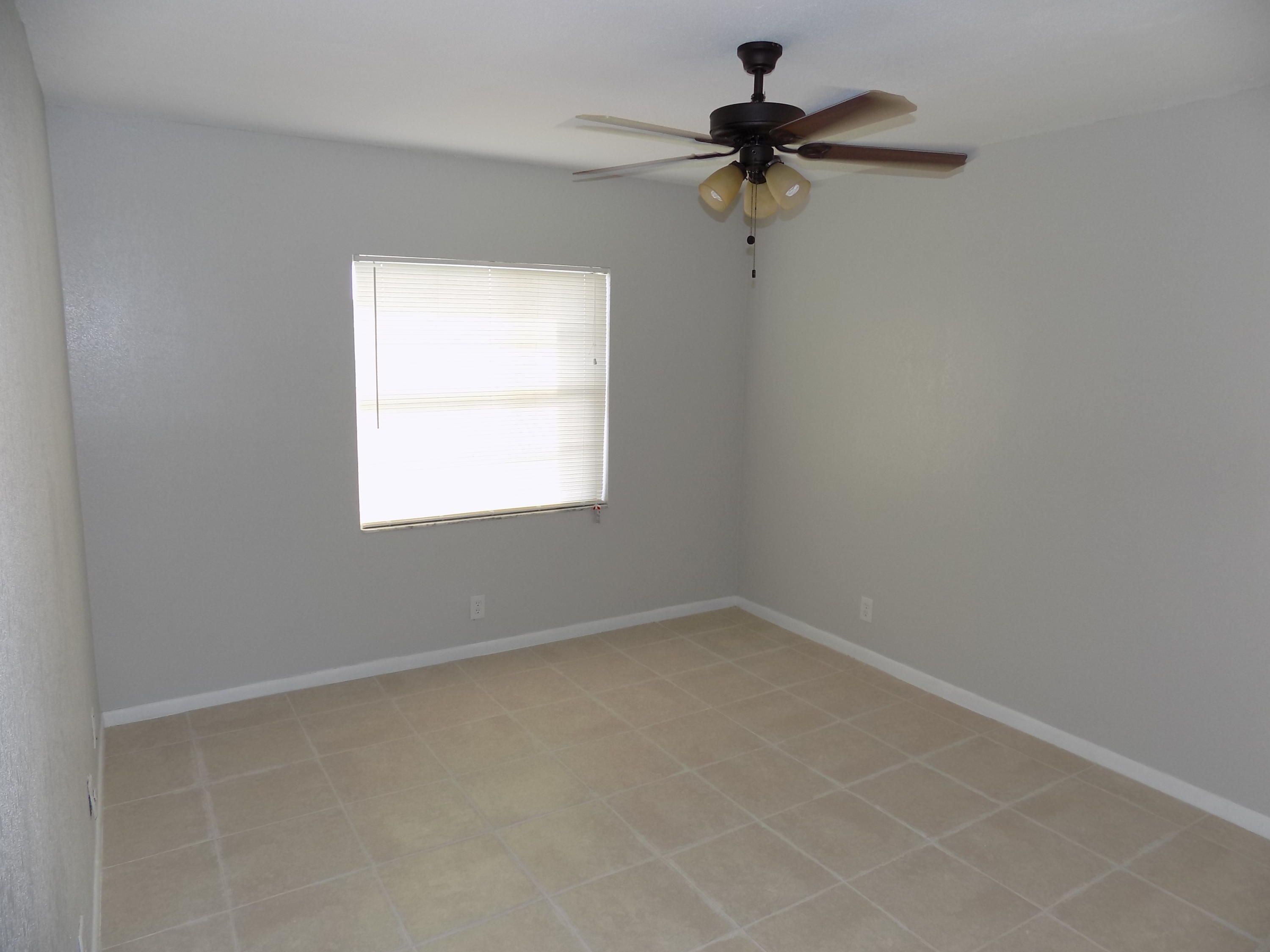1798 Abbey Road, Unit C201 West Palm Beach, FL 33415 - Photo 10 of 26 Master Bedroom Suite